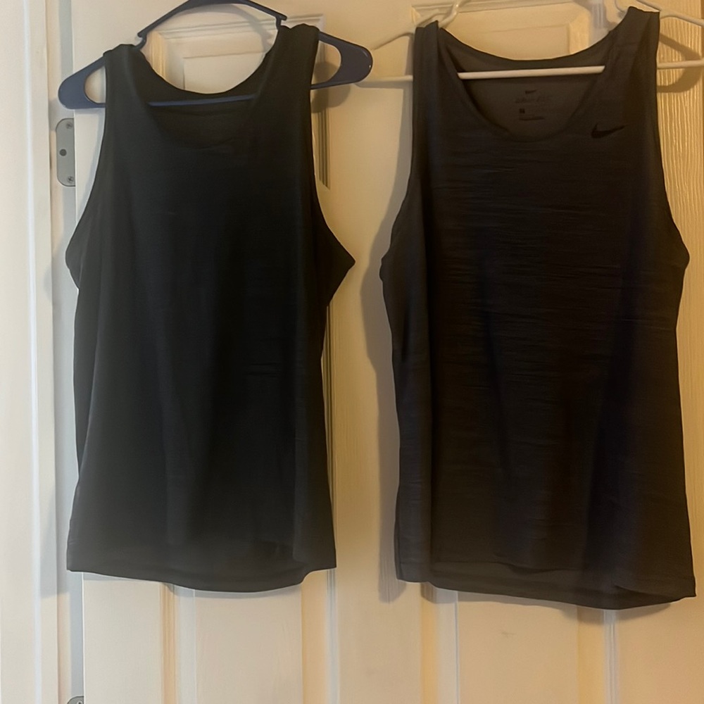 Two Nike dry fit tanks small black/blue